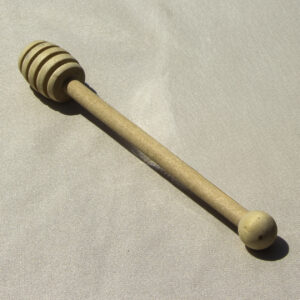 colher de mel em madeira